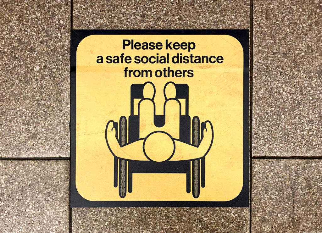 Wheelchair Social distancing decal in nyc subway
