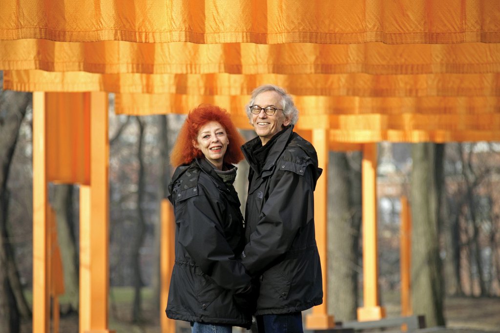 Christo and Jeanne-Claude posing at The Gates in Central Park
