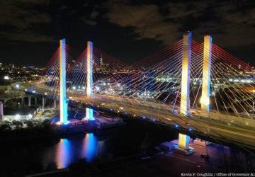 Kosciuszko Bridge lit in blue and gold