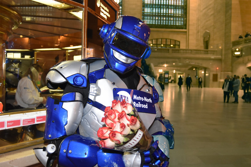 Metro Man in Grand Central with flowers