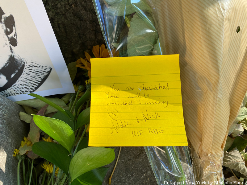 Flowers and note left by people at Ruth Bader Ginsburg's home