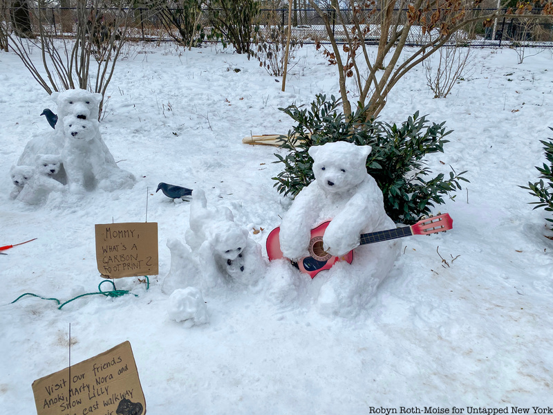 Snowbanksy polar bear sculptures playing guitar