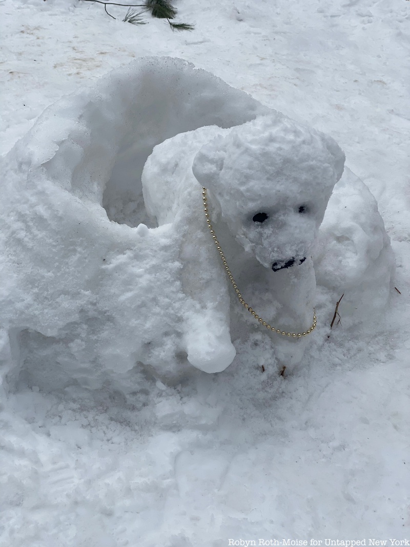 Polar bear with beaded necklace