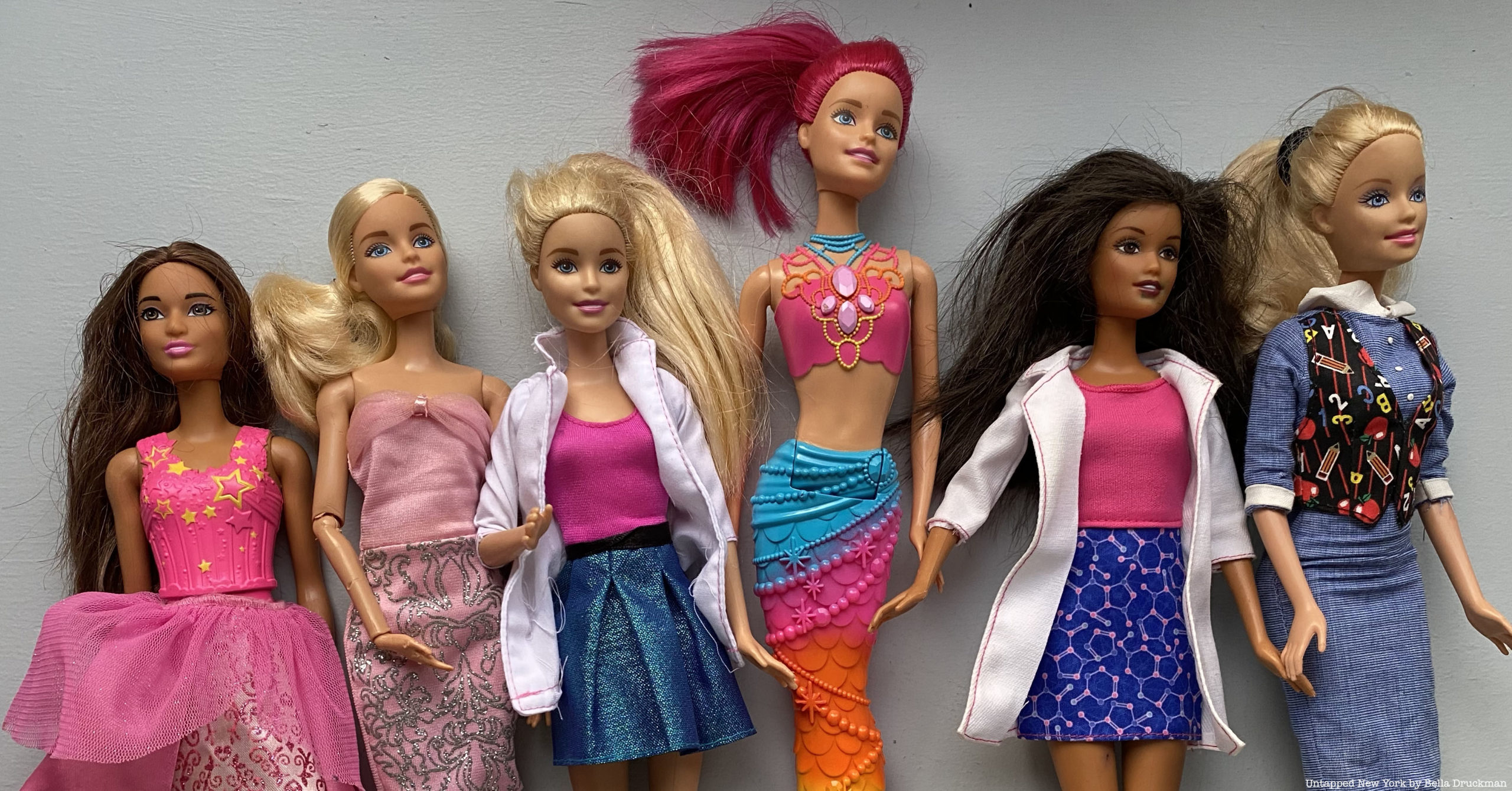 Line of Barbies extend past Barbie in New York.
