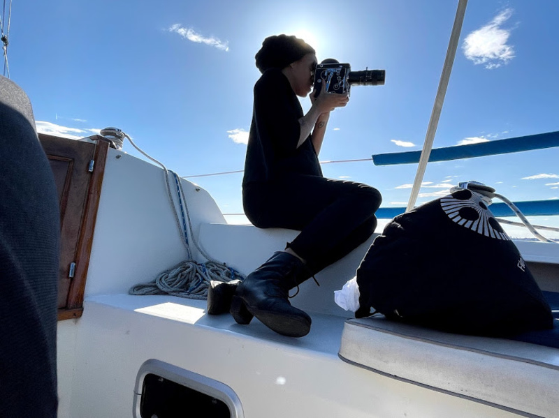 Ayanna Dozier capturing footage of Hart island for her exhibit about "Negro Coney Island."