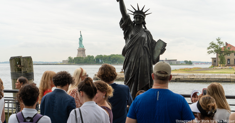 Crowds in front of Statue of Liberty replica