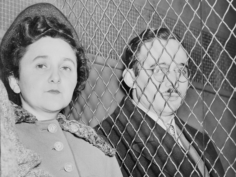 Julius and Ethel Rosenberg accused of giving Manhattan Project information to Russia. 