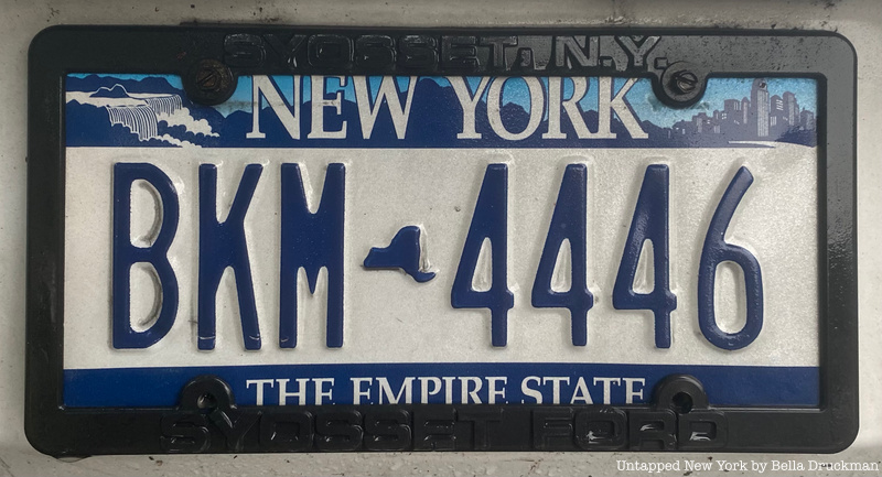 The New York license plate featuring Niagara Falls and the New York City skyline.