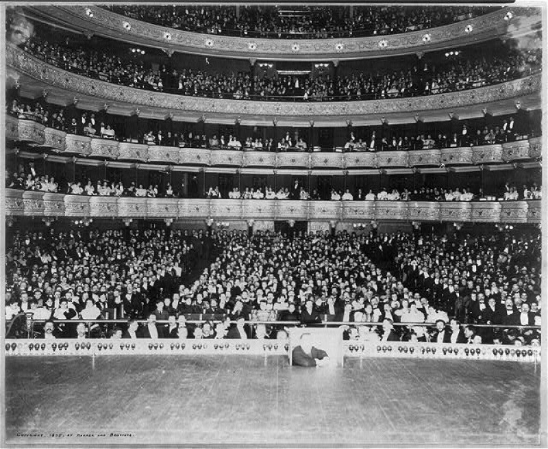 New York Society in balconies. View from the stage of the Metropolitan Opera House

