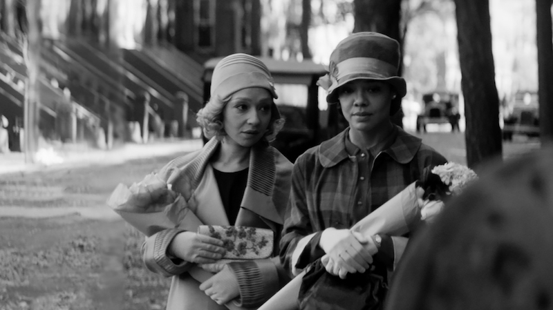 A scene from Passing on Netflix showing two women in 1920s garb