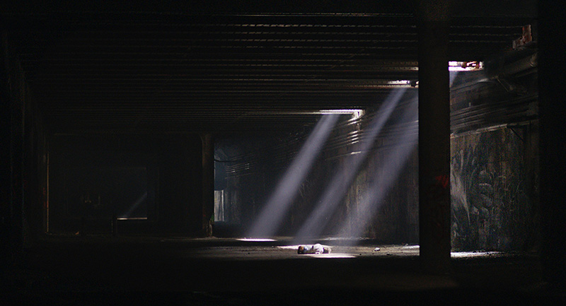 Shafts of light in Freedom Tunnel, still from Topside