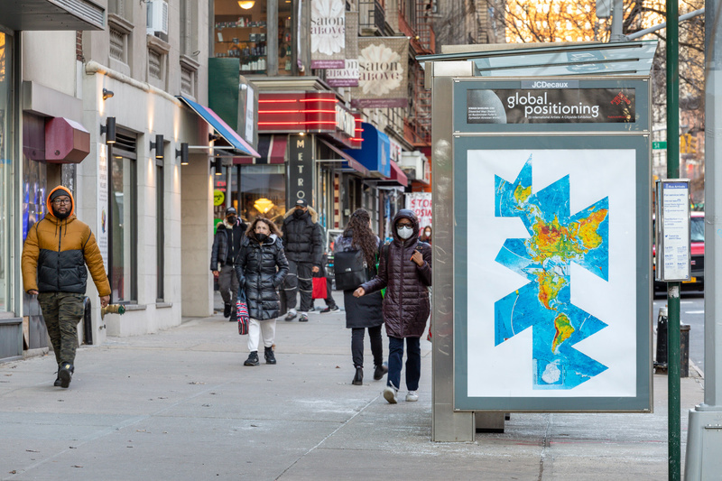 Kwan Sheung Chi's "Dissected Map (Based on Buckminster Fuller's Dymaxion Airocean World)" at NYC bus stop