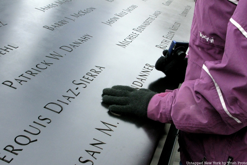 hands on the September 11 memorial