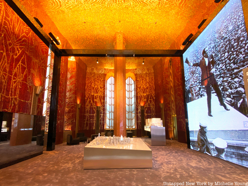 Red Room at One Wall Street with screen showing vintage image