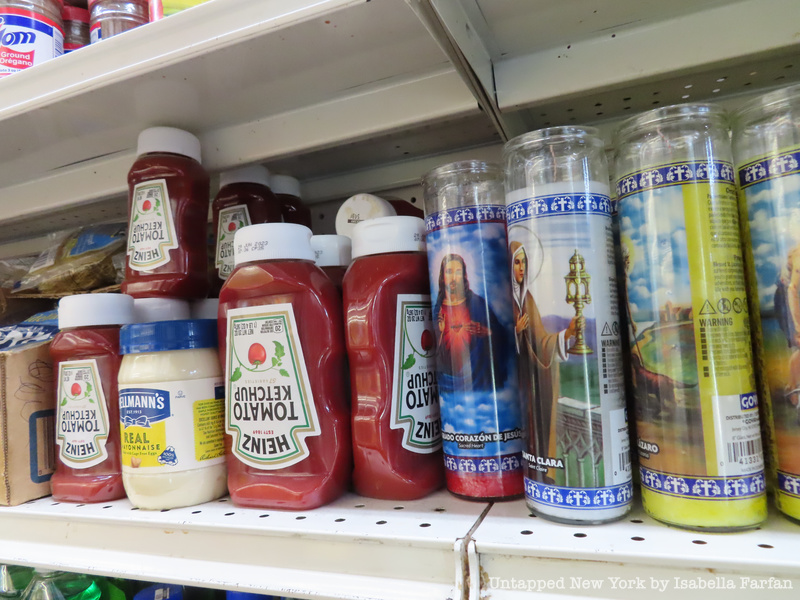 Ketchup. Mayonnaise, and religious candles in a bodega.