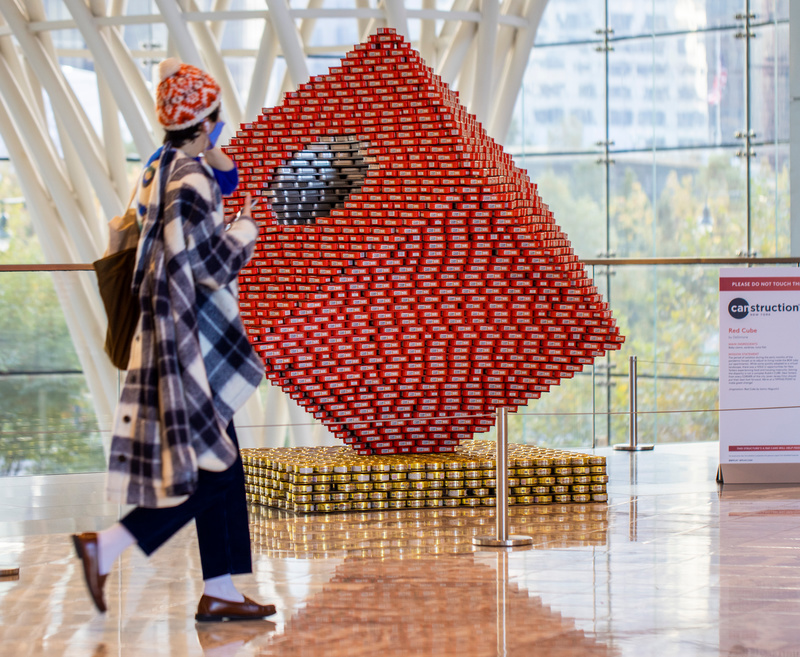 A red cube made out of bricks in a public art installation at Brookfield Place