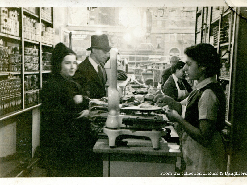 Mark Russ Federman's mother, Anne, serves customers at Russ and Daughters in 1939.