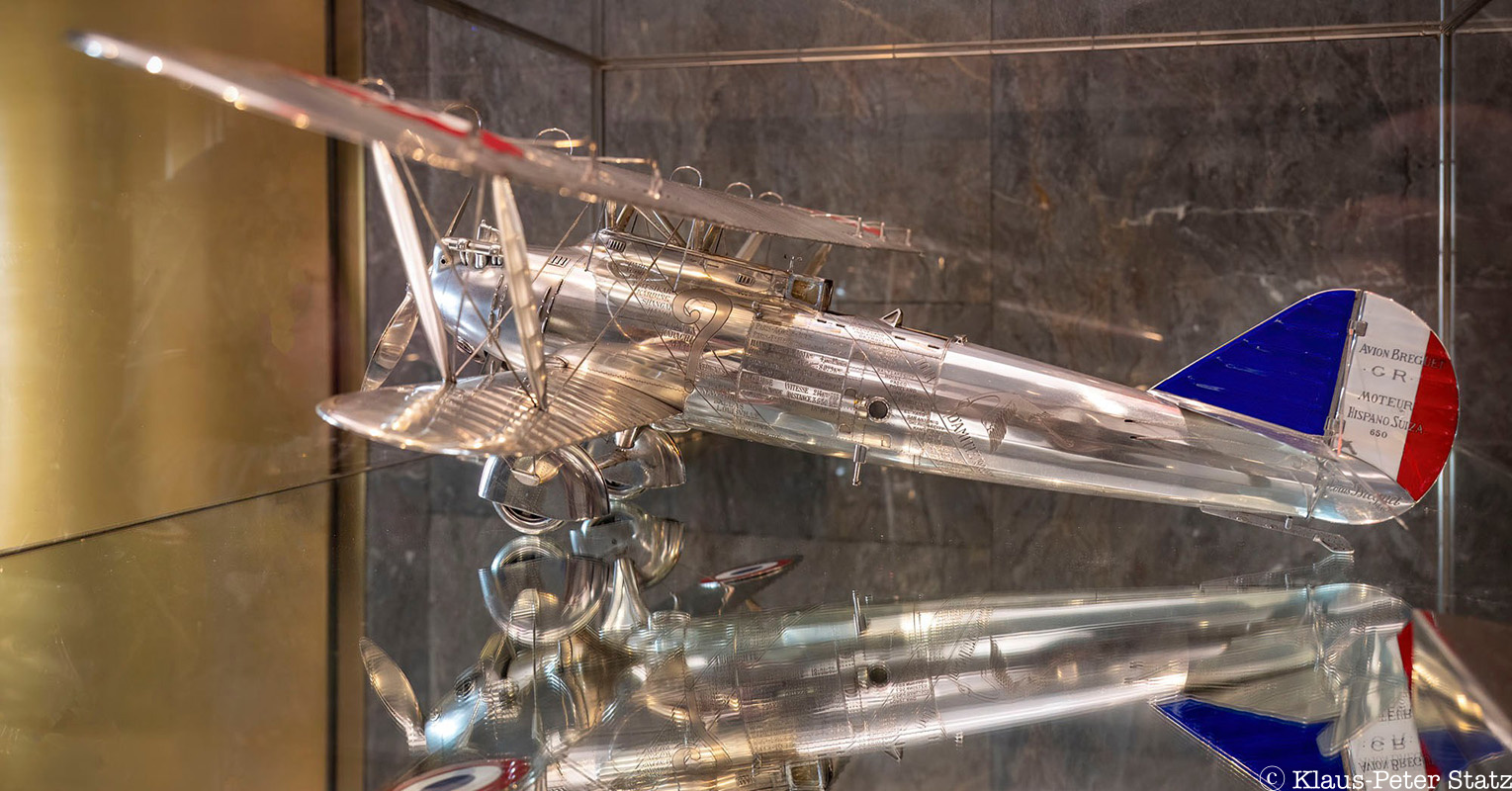 A side view of the sterling silver plane created by Cartier inside Rockefeller Center