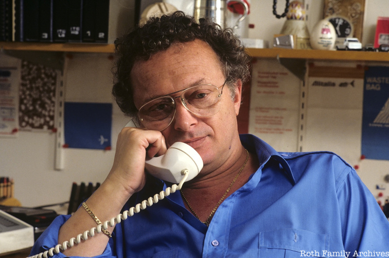 Richard Roth Jr on the telephone in his office