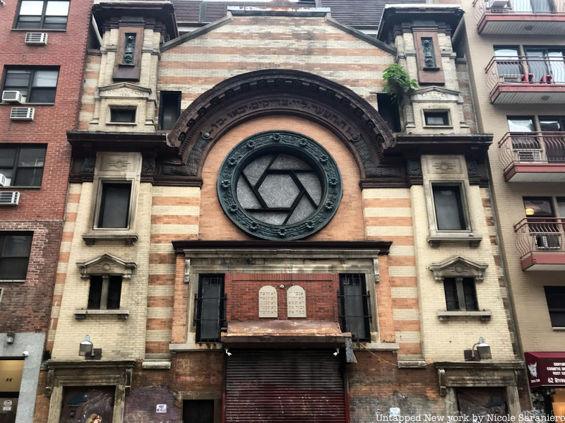 A repurposed synagogue on the Lower East Side that is now an artist studio. The window looks like a camera aperture.
