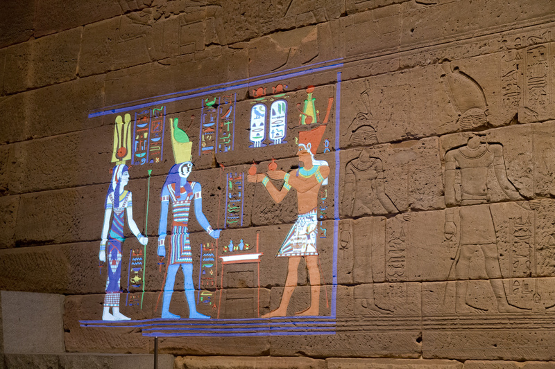 This display shows one vignette on the south wall of the Temple of Dendur colored by light to suggest how it might have looked when painted in the Roman Period. 