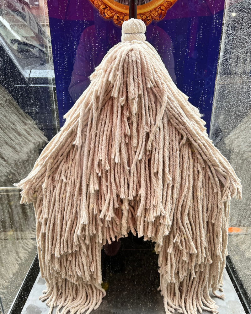 Barkitecture doghouse made out of mop heads