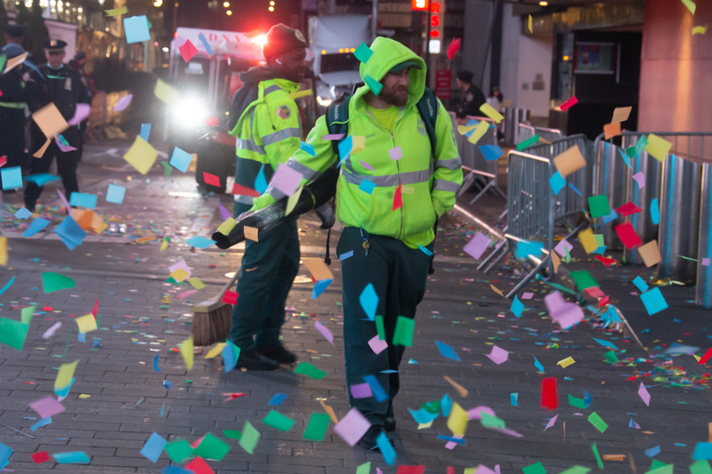Cleaning up the New Year's Eve confetti drop