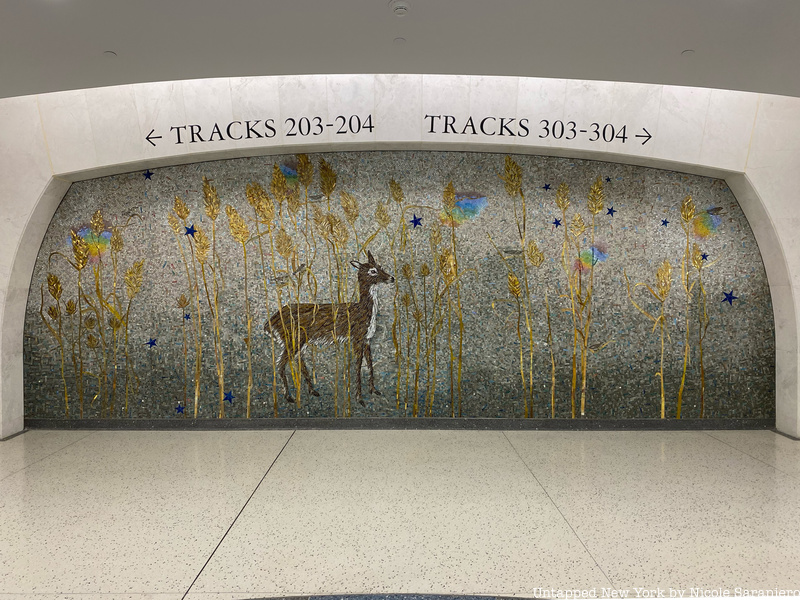 A deer surrounded by wheat glass mosaic by Kiki Smtih