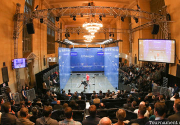 Squash Championship enclosure surrounded by crowds at Grand Central Terminal