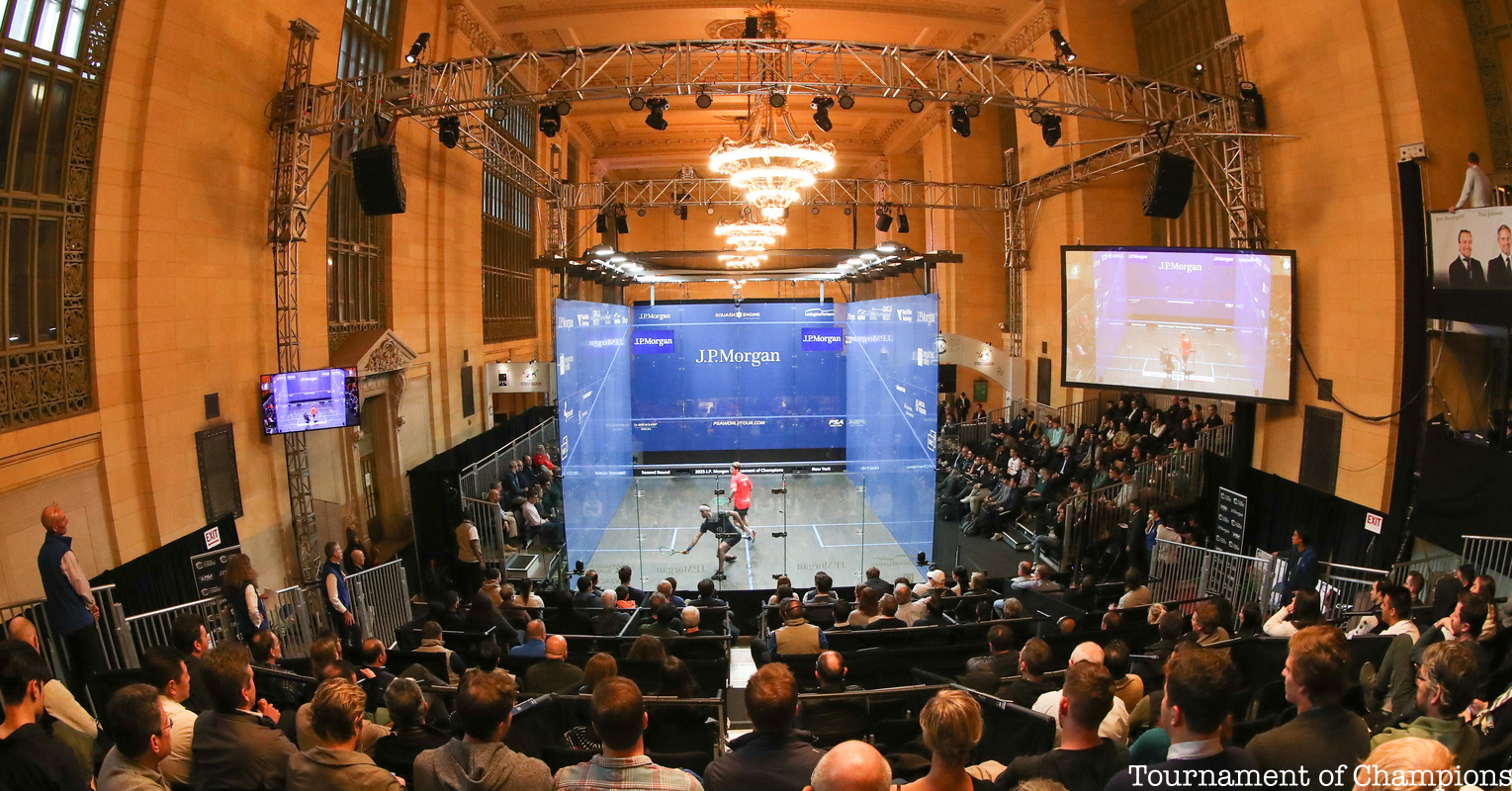 Squash Championship enclosure surrounded by crowds at Grand Central Terminal