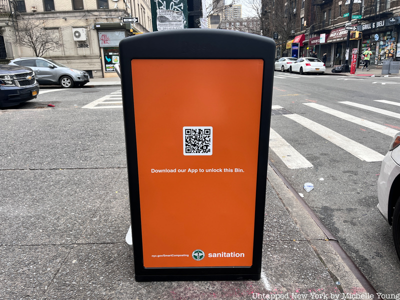 QR on the side of an orange smart compost bin in NYC