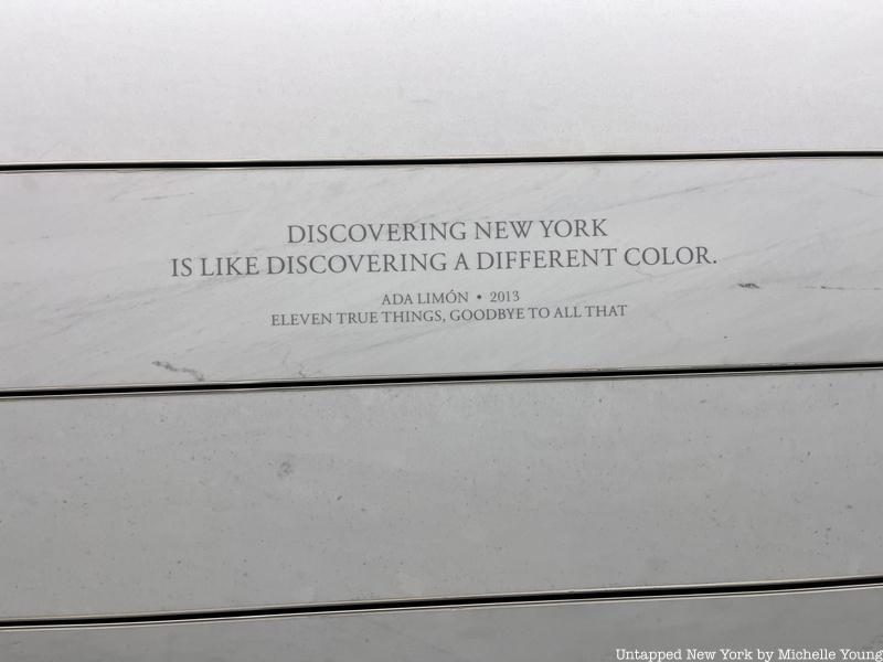 "Discovering New york is like discovering a different color" carved into a train station wall