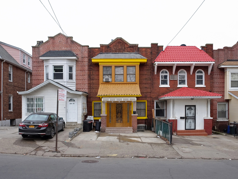 Three brick houses in Queens