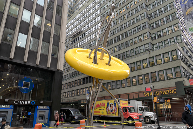 The new yellow Big Button sculpture in Manahattan's Garment District, NYC