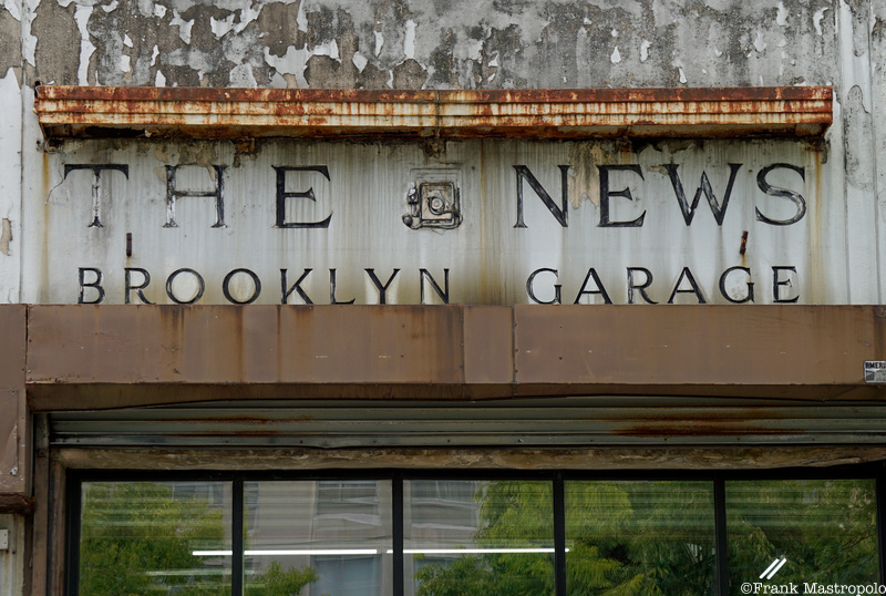 A ghost sign on the old Daily News garage building in Brooklyn