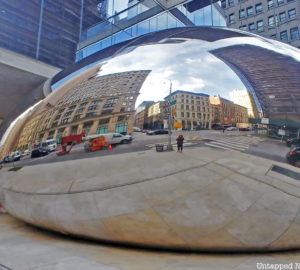 Bean shaped reflective sculpture by Anish Kapoor at 58 Leonard in Tribeca