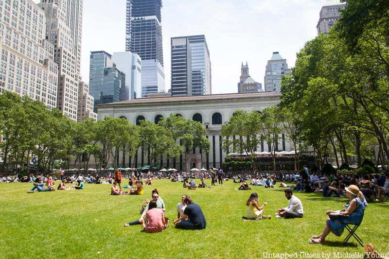 People lounging on the lawn of Bryant Park on a sunny day