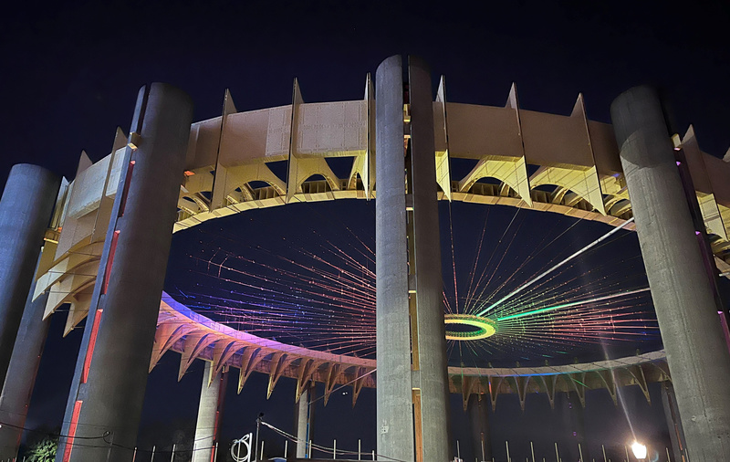 New York State Pavilion light up by multiple colors at night