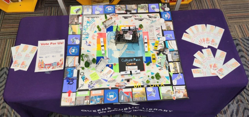 Board game themed book display contest contestant