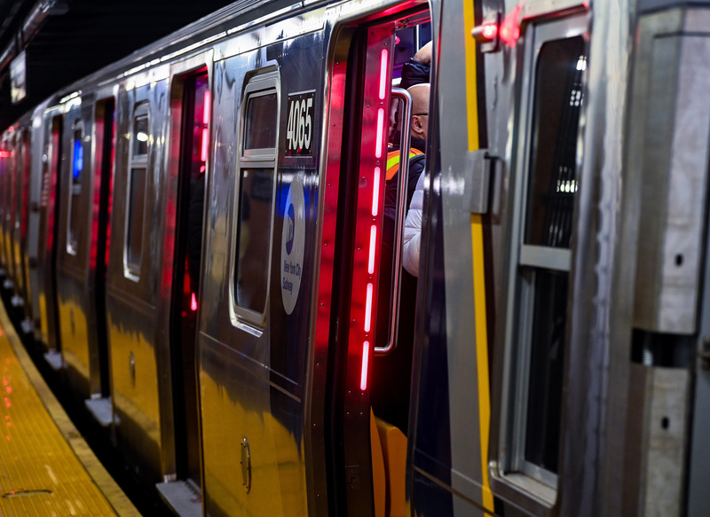 Subway car doors with red lights