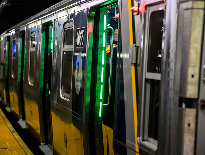 Subway car doors with green lights