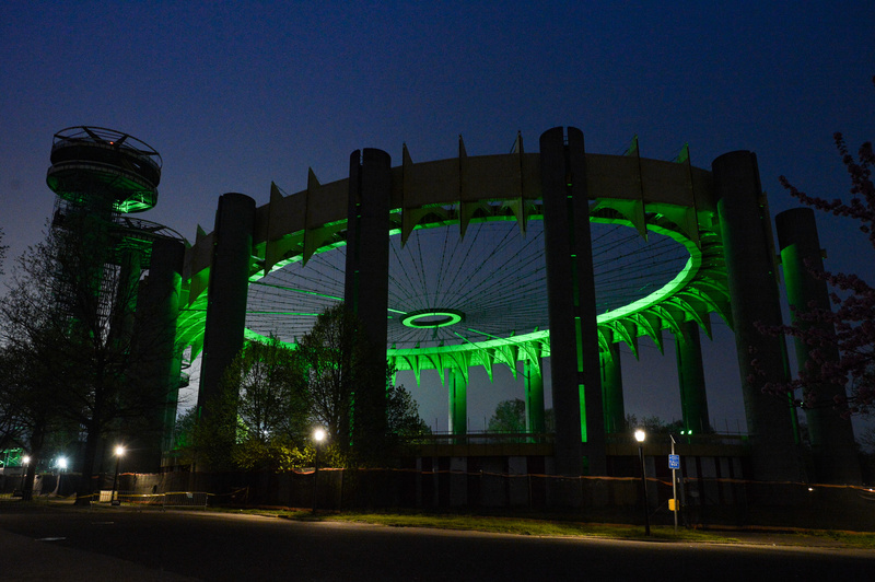 New York State Pavilion lit up green