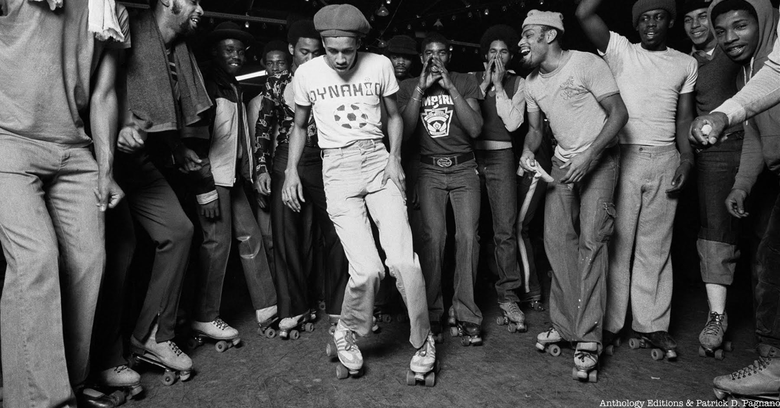 Skaters at Empire Roller Rink in the 1970s, black and white photo