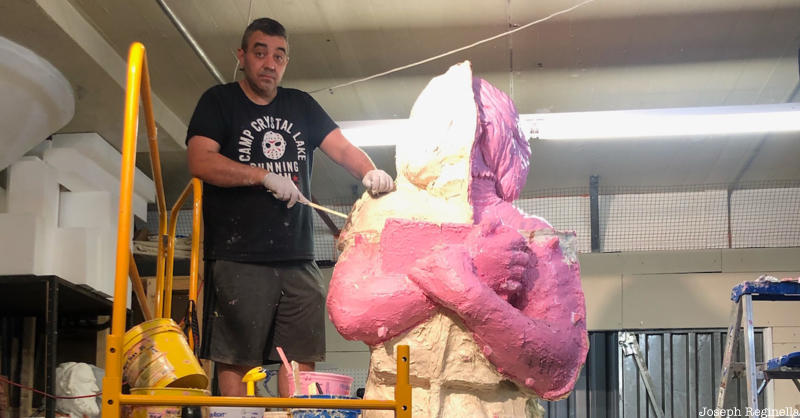 Joseph Reginella works on a large sculpture