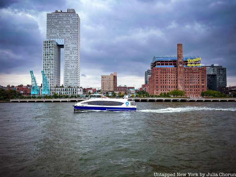 NYC Ferry against backdrop of Brooklyn