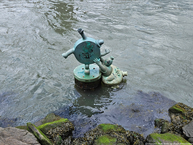 Tom Otterness sculpture in the East River just off Roosevelt Island