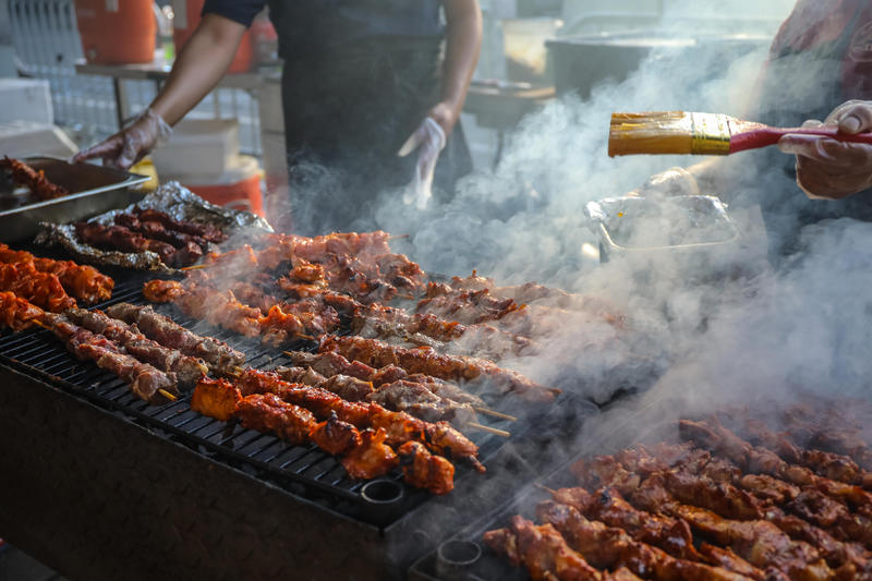 Food being cooked at Uptown Night Market in Harlem