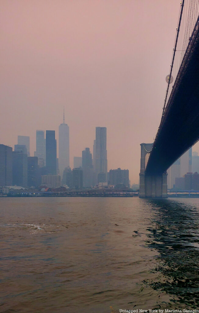 Brooklyn Bridge and Lower Manhattan under hazy skies