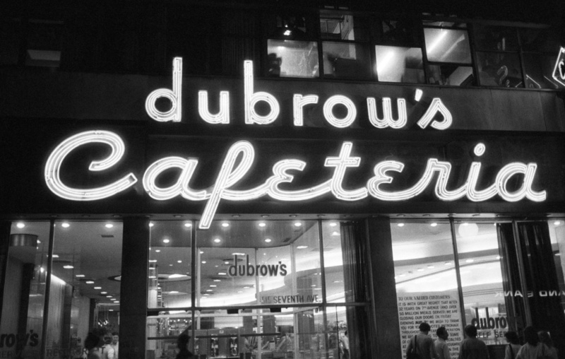 Dubrow's Cafeteria neon sign in a black and white photo