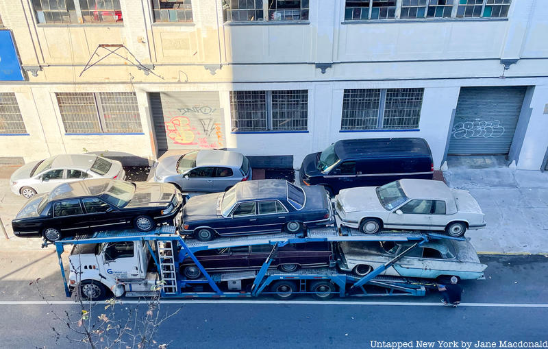 Another aerial view of Autobabysitters with cars being trucked away